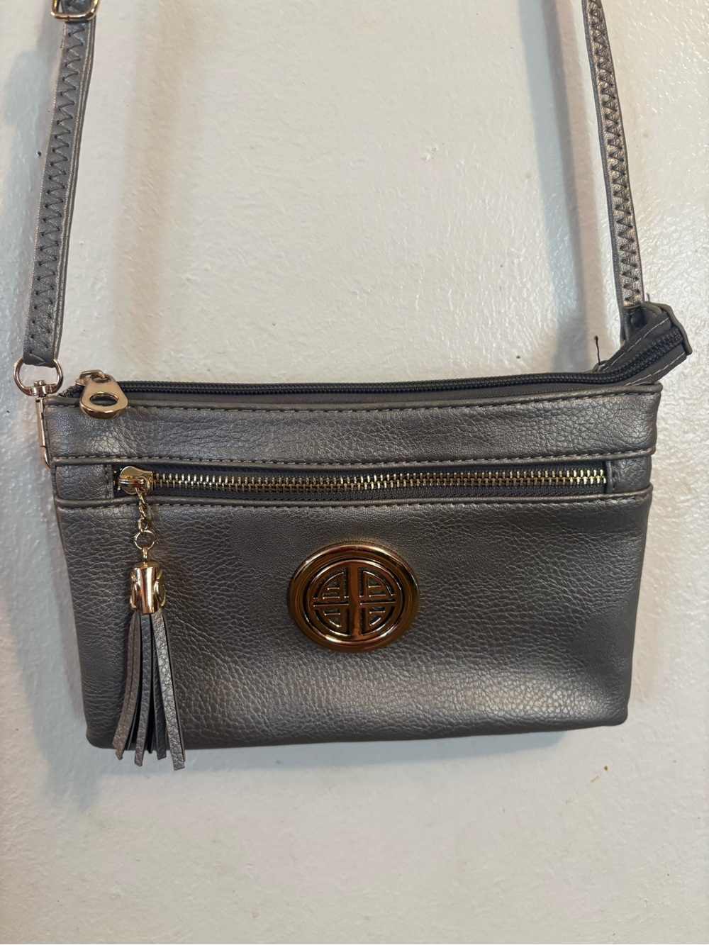 Stylish Metallic Gray Crossbody Bag with Tassel